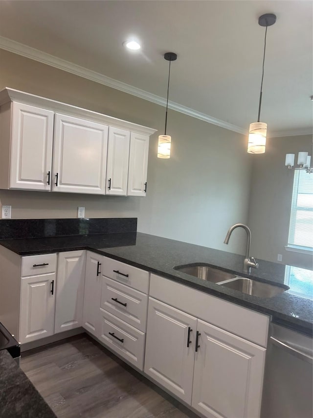 1009 S Preston St, Ennis, TX 75119 - kitchen with dishwasher, crown molding, a sink, white cabinets, and dark wood finished floors