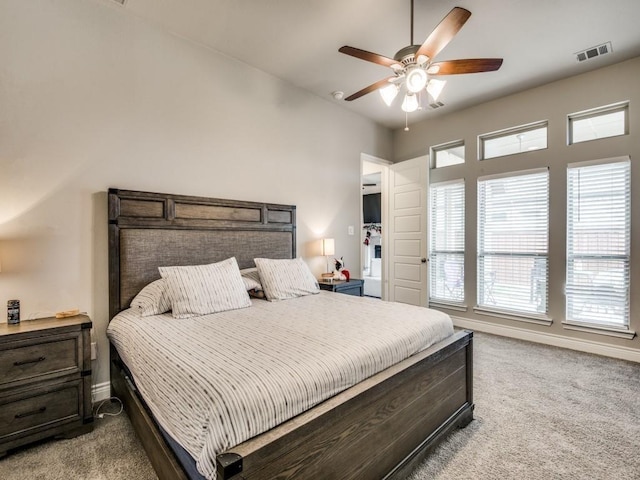 bedroom featuring carpet, ceiling fan, and baseboards