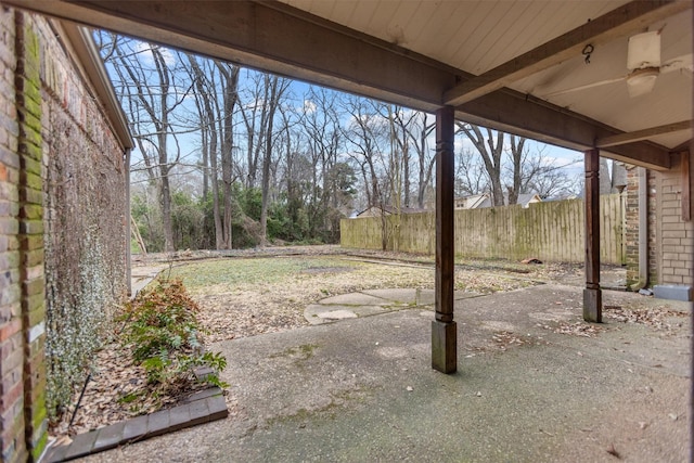 view of yard with a patio and fence