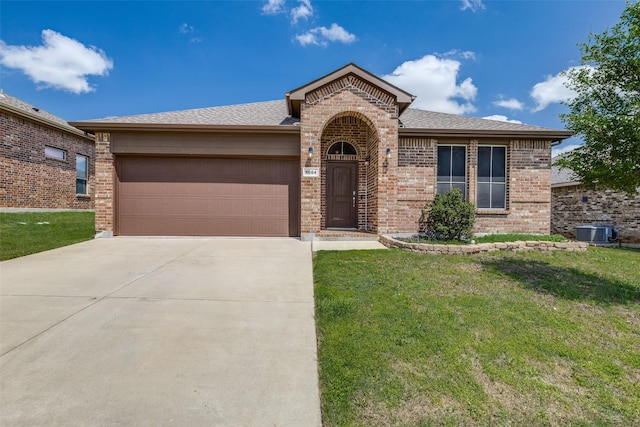 1004 Pierz Dr, Fort Worth, TX 76177 - view of front facade featuring brick siding, an attached garage, and a front lawn