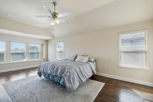 bedroom with baseboards, dark wood-style flooring, lofted ceiling, and a ceiling fan