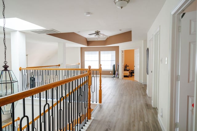 3221 Summerfield Dr, Richardson, TX 75082 - corridor featuring light wood-style flooring, an upstairs landing, and baseboards