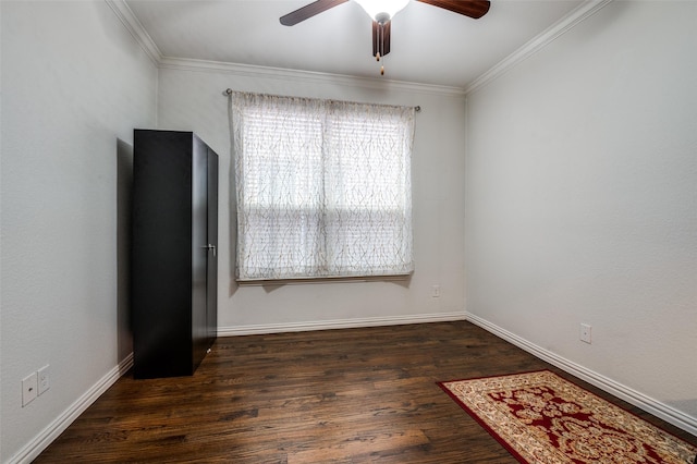 spare room with ceiling fan, plenty of natural light, baseboards, and ornamental molding