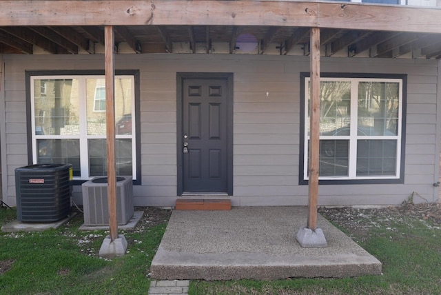 property entrance featuring central AC