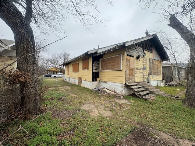 1805 Fillmore St, Wichita Falls, TX 76309 - view of home's exterior with entry steps and fence