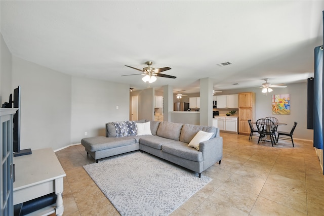 1833 Ramada Trl, Fort Worth, TX 76247 - living area with ceiling fan, light tile patterned flooring, and baseboards