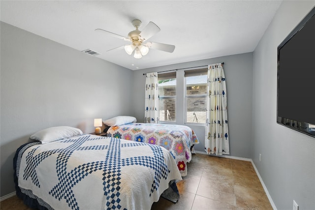 1833 Ramada Trl, Fort Worth, TX 76247 - tiled bedroom with baseboards and ceiling fan