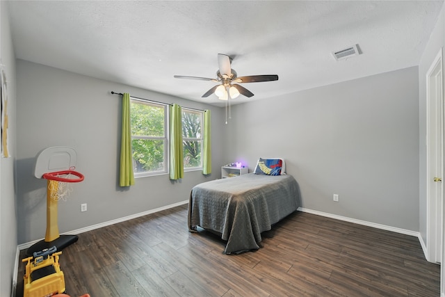 1833 Ramada Trl, Fort Worth, TX 76247 - bedroom with dark wood finished floors, baseboards, and a ceiling fan