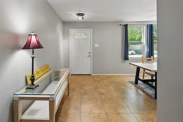 1833 Ramada Trl, Fort Worth, TX 76247 - foyer featuring light tile patterned floors and baseboards