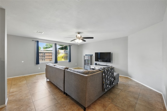 1833 Ramada Trl, Fort Worth, TX 76247 - living area with ceiling fan, baseboards, and tile patterned flooring