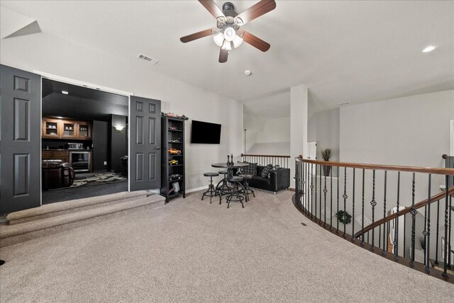 sitting room featuring carpet floors, ceiling fan, recessed lighting, and baseboards