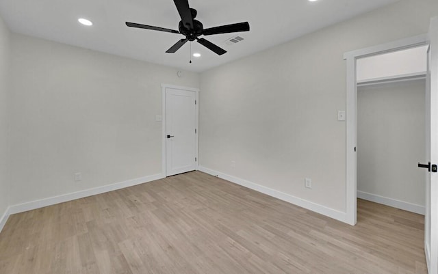 1713 Reuter Ave, Waco, TX 76708 - unfurnished bedroom featuring light wood-type flooring, recessed lighting, a spacious closet, a closet, and baseboards