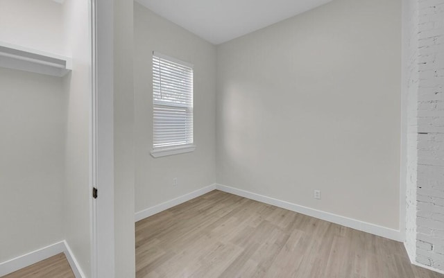 1713 Reuter Ave, Waco, TX 76708 - unfurnished bedroom with light wood-style floors and baseboards