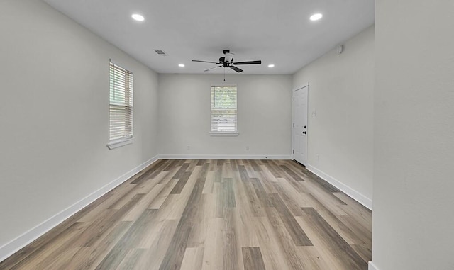 1713 Reuter Ave, Waco, TX 76708 - spare room with ceiling fan, healthy amount of natural light, wood finished floors, recessed lighting, and baseboards