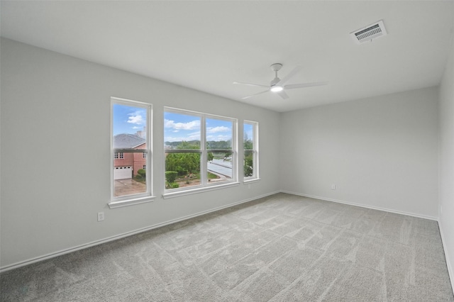 3169 Longbow Dr, Grand Prairie, TX 75052 - carpeted spare room with ceiling fan and baseboards