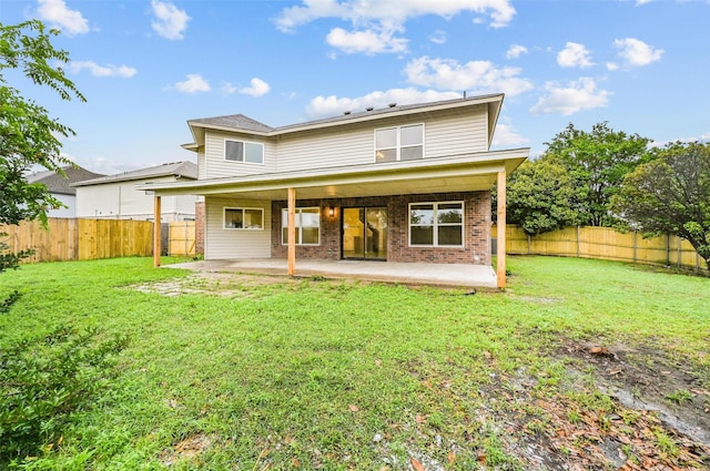 3169 Longbow Dr, Grand Prairie, TX 75052 - back of house with a patio area and brick siding