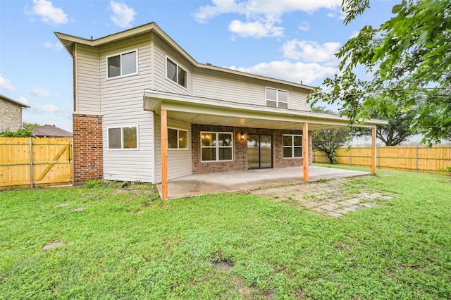 3169 Longbow Dr, Grand Prairie, TX 75052 - back of property featuring brick siding and a patio area