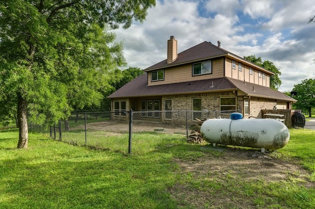 870 1st St, Maypearl, TX 76064 - back of property featuring a chimney, brick siding, and roof with shingles