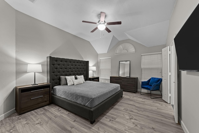 4719 Highlands Dr, Mckinney, TX 75070 - bedroom with baseboards, light wood finished floors, vaulted ceiling, and ceiling fan