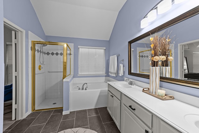 4719 Highlands Dr, Mckinney, TX 75070 - bathroom with vaulted ceiling, a shower stall, double vanity, a bath, and tile patterned floors