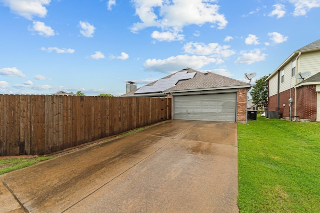 4719 Highlands Dr, Mckinney, TX 75070 - view of property exterior featuring central air condition unit, driveway, a shingled roof, brick siding, and a garage