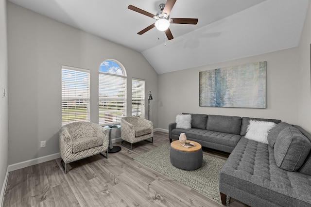 4719 Highlands Dr, Mckinney, TX 75070 - living area with ceiling fan, baseboards, wood finished floors, and vaulted ceiling