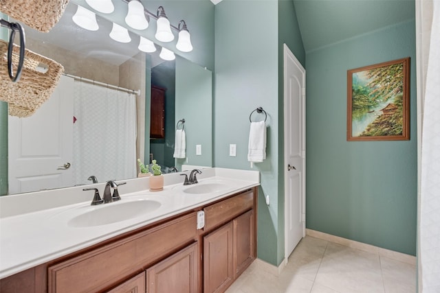 5221 Buckthorn Dr, Mckinney, TX 75071 - bathroom with tile patterned floors, double vanity, baseboards, and a shower with curtain