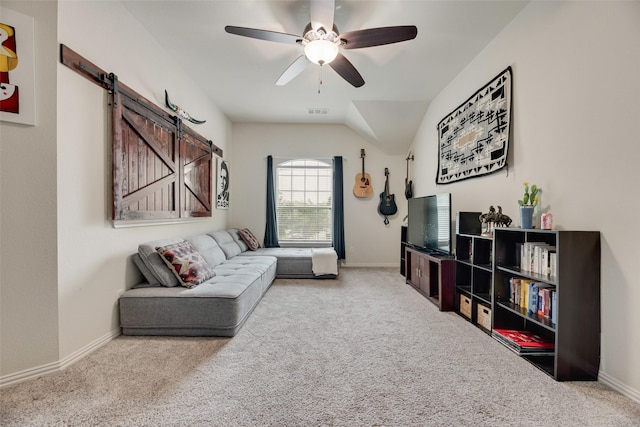 5221 Buckthorn Dr, Mckinney, TX 75071 - carpeted living room with a barn door, ceiling fan, and baseboards