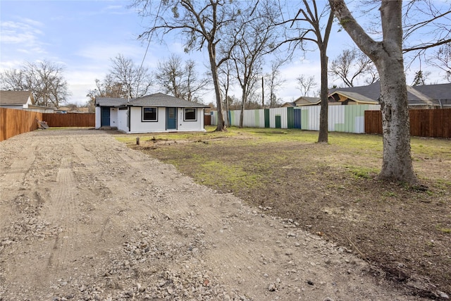 4205 Humphrey Dr, Dallas, TX 75216 - view of yard with dirt driveway and fence