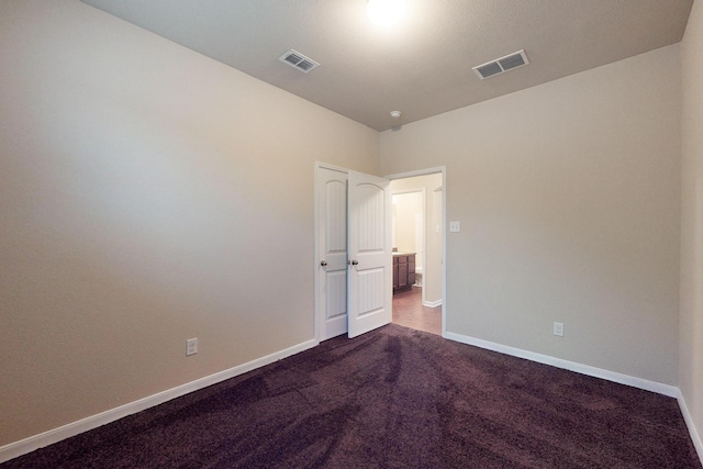 4861 Nuevo Laredo Ct, Dallas, TX 75236 - unfurnished room with dark carpet and baseboards