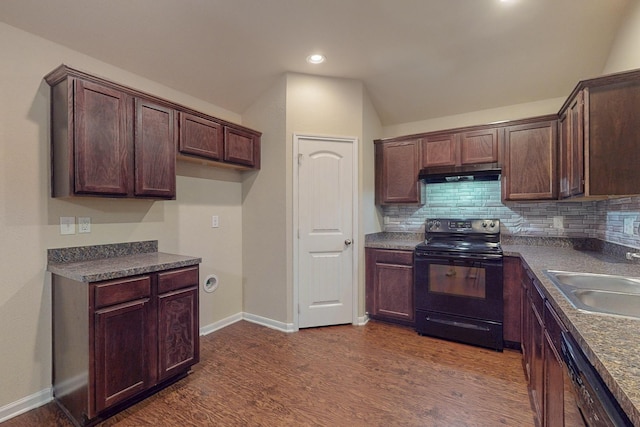 4861 Nuevo Laredo Ct, Dallas, TX 75236 - kitchen featuring black appliances, under cabinet range hood, a sink, dark countertops, and dark wood-style flooring