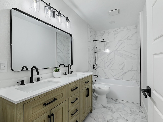 737 Finland St, Grand Prairie, TX 75050 - bathroom with marble finish flooring, toilet, double vanity, and shower / bathtub combination