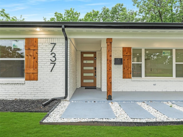 737 Finland St, Grand Prairie, TX 75050 - entrance to property with brick siding