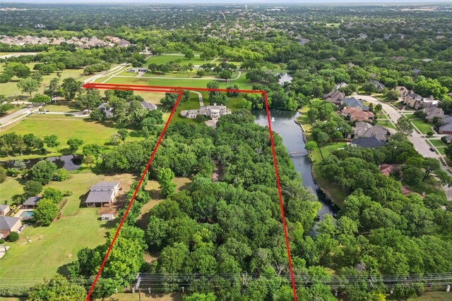 800 John Mccain Rd, Colleyville, TX 76034 - aerial view of property and surrounding area featuring property boundaries highlighted and a nearby body of water