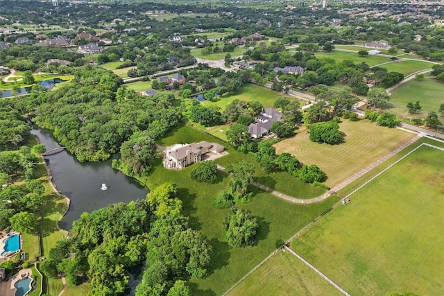 800 John Mccain Rd, Colleyville, TX 76034 - aerial view of property and surrounding area featuring a nearby body of water and a tree filled landscape
