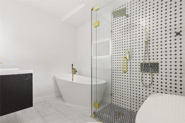 5726 Enchanted Ln, Dallas, TX 75227 - full bathroom featuring a shower stall, a freestanding bath, baseboards, and vanity