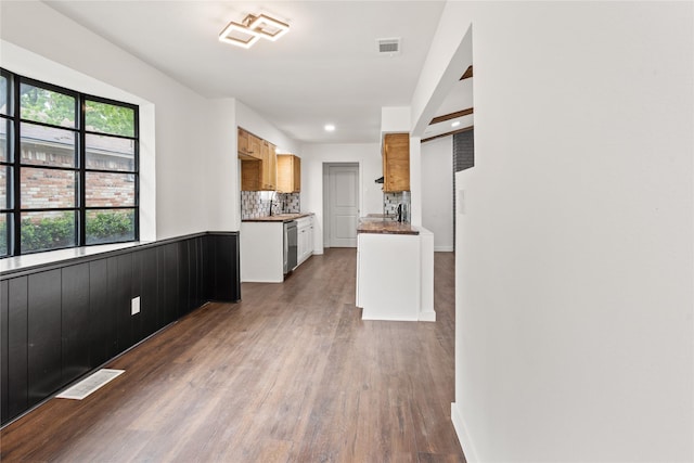 5726 Enchanted Ln, Dallas, TX 75227 - kitchen featuring stainless steel dishwasher, dark wood-style flooring, decorative backsplash, a sink, and recessed lighting