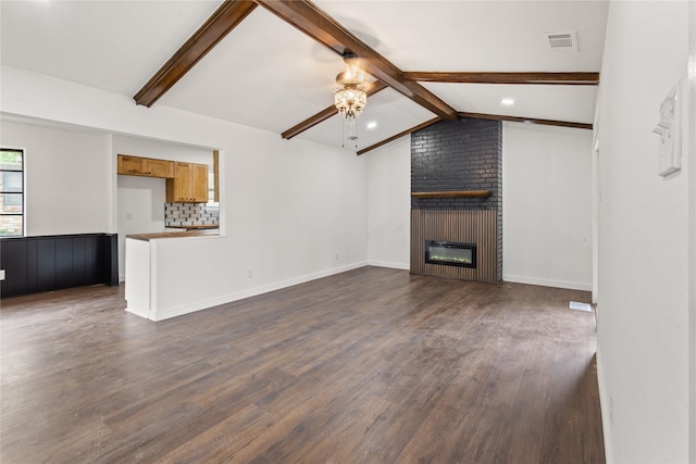 5726 Enchanted Ln, Dallas, TX 75227 - unfurnished living room with ceiling fan, dark wood-style floors, and a fireplace