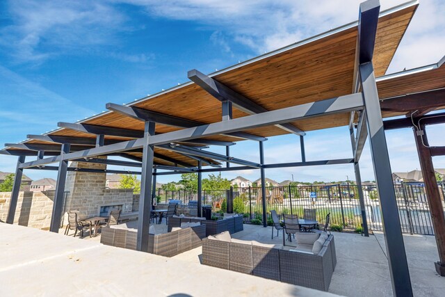 7613 Bluebell Ln, Mckinney, TX 75071 - view of patio featuring an outdoor hangout area and fence