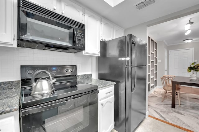 kitchen featuring black appliances, white cabinets, backsplash, light carpet, and ornamental molding