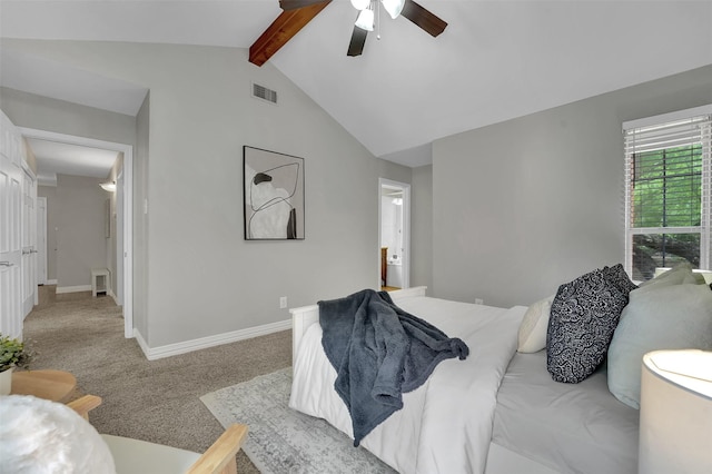 carpeted bedroom featuring baseboards, a ceiling fan, and ensuite bathroom