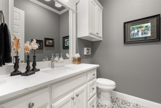 233 Park N Ln, Keller, TX 76248 - bathroom featuring vanity, tile patterned flooring, toilet, baseboards, and ornamental molding