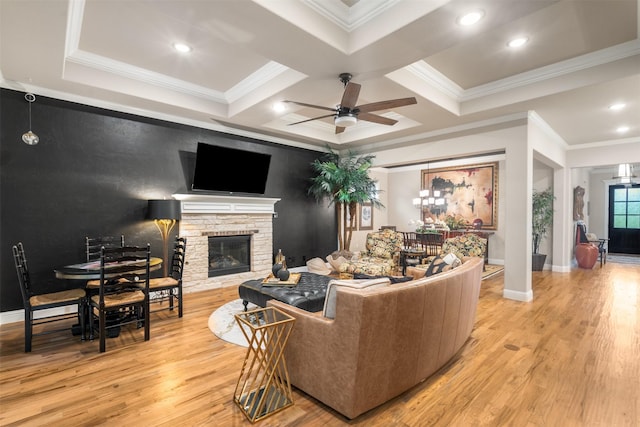 233 Park N Ln, Keller, TX 76248 - living room featuring light wood-style flooring, a stone fireplace, a ceiling fan, baseboards, and crown molding