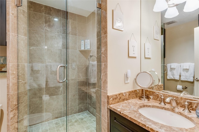 5909 Luther Ln Unit 1700, Dallas, TX 75225 - carpeted bedroom featuring a tray ceiling, baseboards, and a ceiling fan