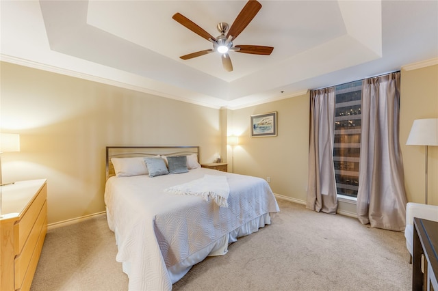 5909 Luther Ln Unit 1700, Dallas, TX 75225 - bedroom with a tray ceiling, carpet flooring, baseboards, and a ceiling fan