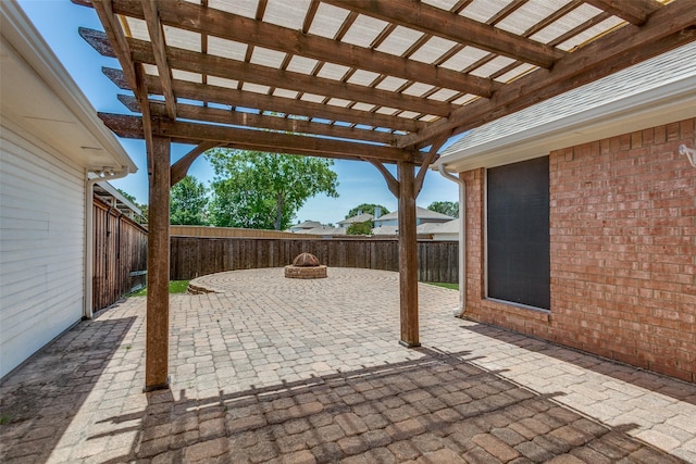 view of patio with a fenced backyard and a pergola
