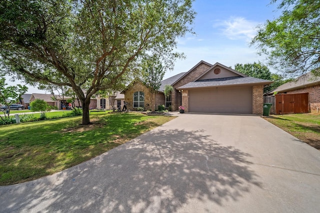 816 Ridgecrest Ct, Aubrey, TX 76227 - ranch-style home with concrete driveway, a front yard, an attached garage, and brick siding