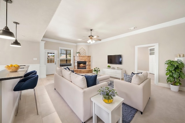 816 Ridgecrest Ct, Aubrey, TX 76227 - living area with a ceiling fan, a fireplace, ornamental molding, and baseboards