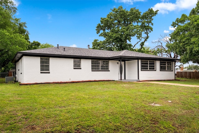 2001 Brenda Ave, Denison, TX 75020 - single story home with central AC unit and a shingled roof