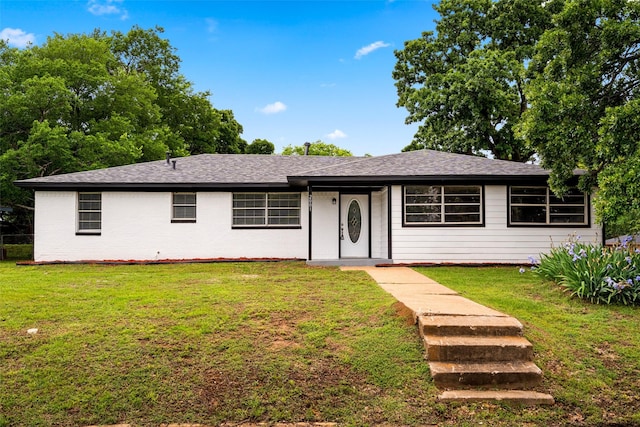 2001 Brenda Ave, Denison, TX 75020 - view of front of property with a front yard and a shingled roof